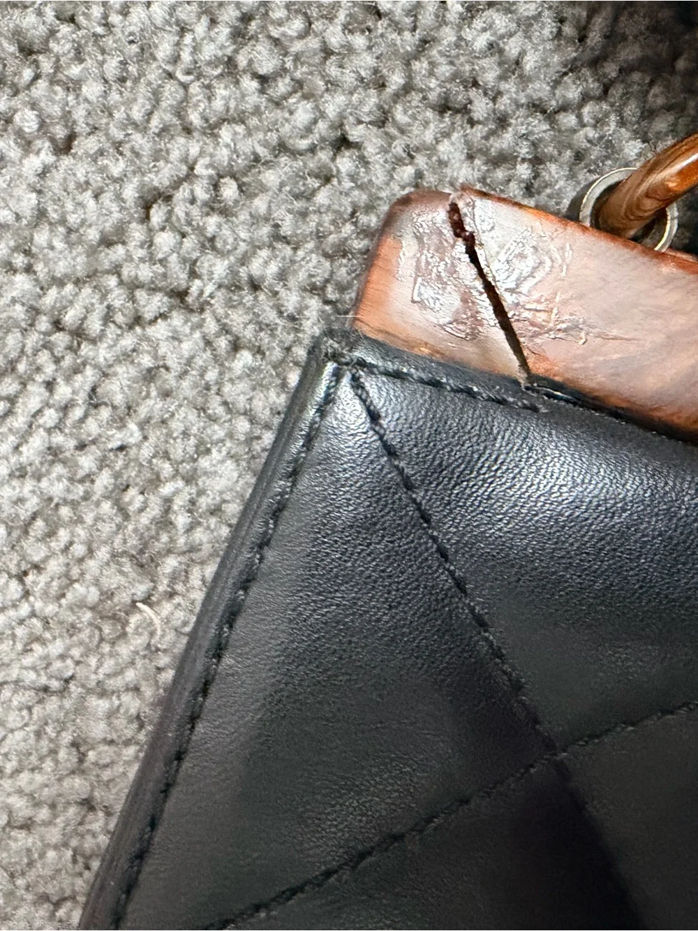 CHANEL Black Quilted Leather Shoulder Bag with Brown Chain